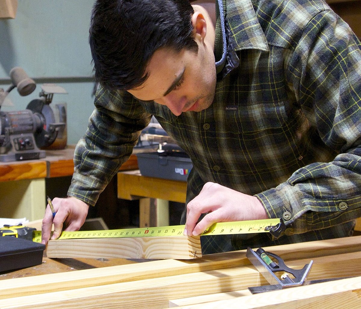 American College of the Building Arts junior measuring for a custom stair