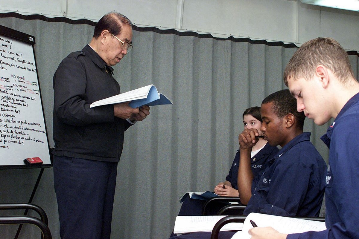 US Navy 020918-N-5972C-002 Instructor teaches sixty two crewmembers aboard USS Essex in elementary Japanese in the ship's chapel lounge